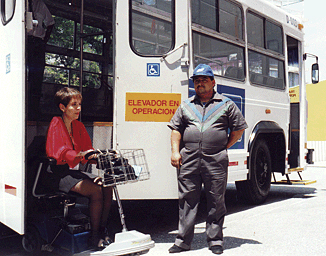 In addition to a wheelchair lift, this bus in Mexico City has a retractable step beneath the front entrance.