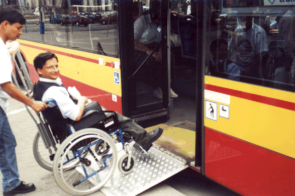 This low-floor bus in Warsaw, Poland, uses an inexpensive hinged ramp which provides easy boarding for passengers with disabilities.