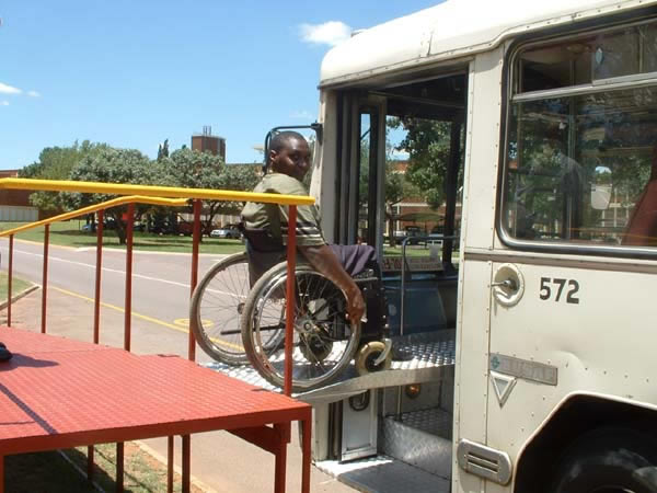 In this version, the bridge piece is mounted under the platform and put into place by the bus driver.<br>This and above photo courtesy of DFID (UK) and CSIR Transportek (South Africa).