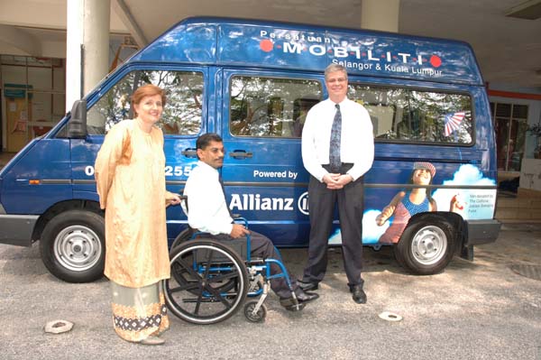 Community initiatives are playing a growing role in providing accessible door-to-door transport in many countries. This accessible van in Kuala Lumpur, Malaysia, belongs to the six-vehicle fleet of Persatuan Mobiliti.<br>Photo courtesy of Persatuan Mobiliti